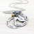 stainless steel 3 layer washer necklace with kids names engraved on each washer and birthstone charms hanging on top.