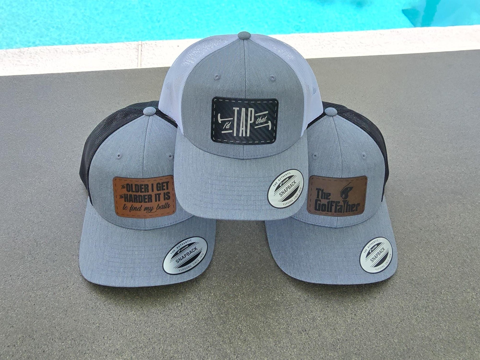 3 hats stacked different designs.