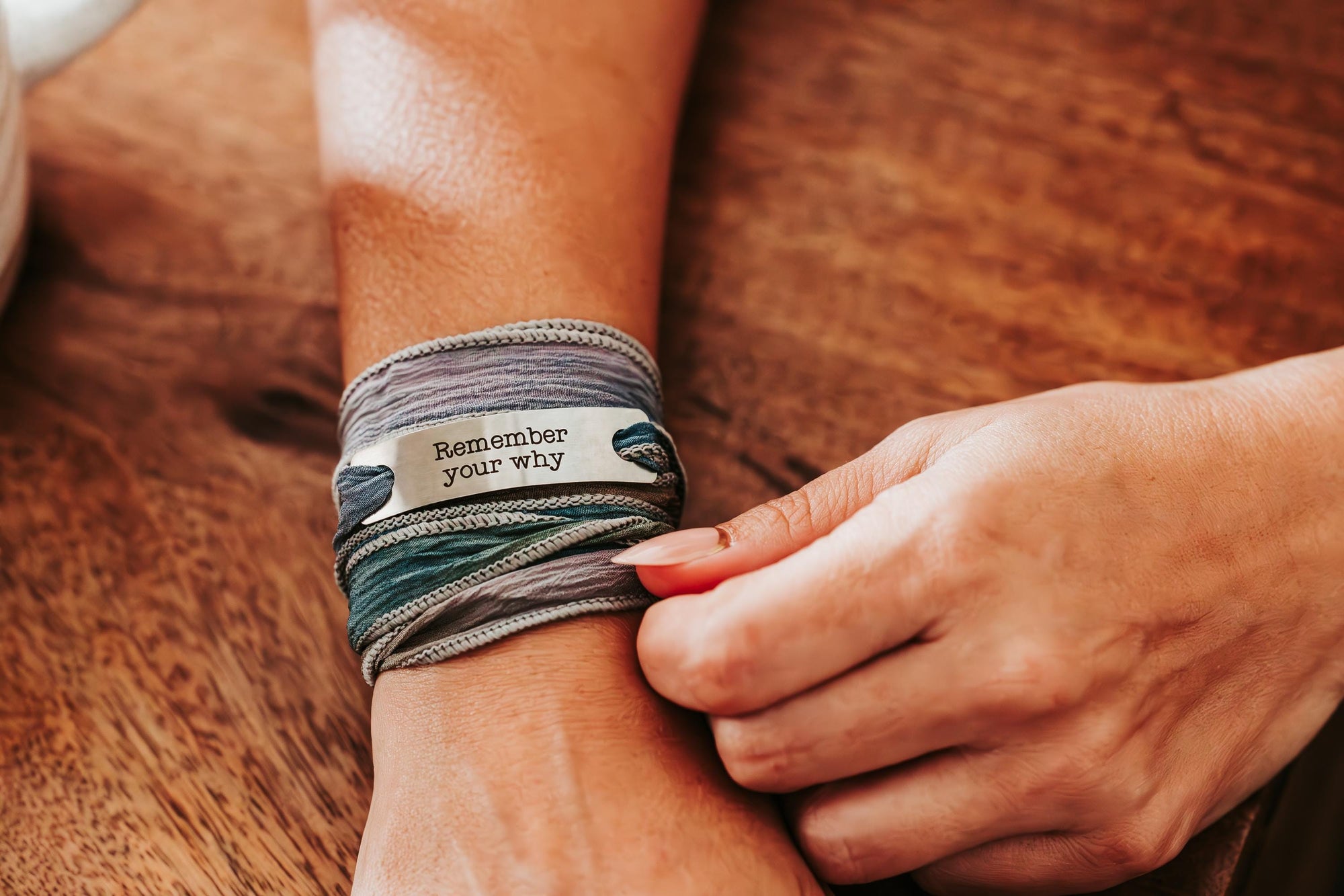 Silk wrap bracelet with stainless steel bar with what you want engraved.